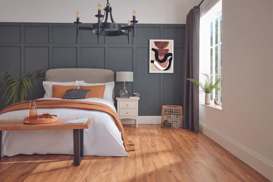 white oak hardwood floor in mid century modern bedroom with earth tones